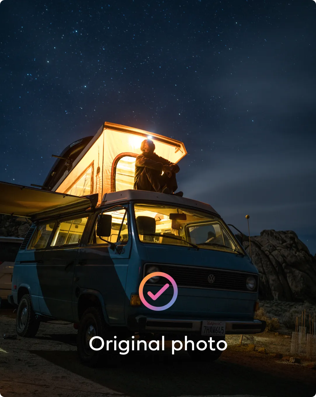 Person sitting on van at night
